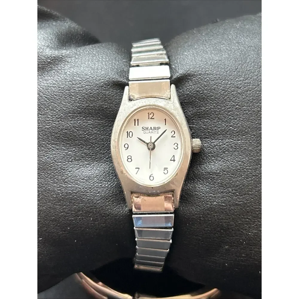 Sharp Silver Tone White Dial Stretch Band Women’s Quartz Watch